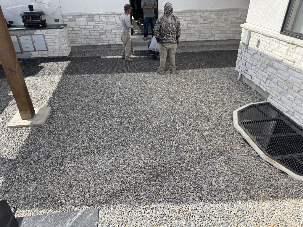 Supplied installation reference showing aggregate work around posts and grates